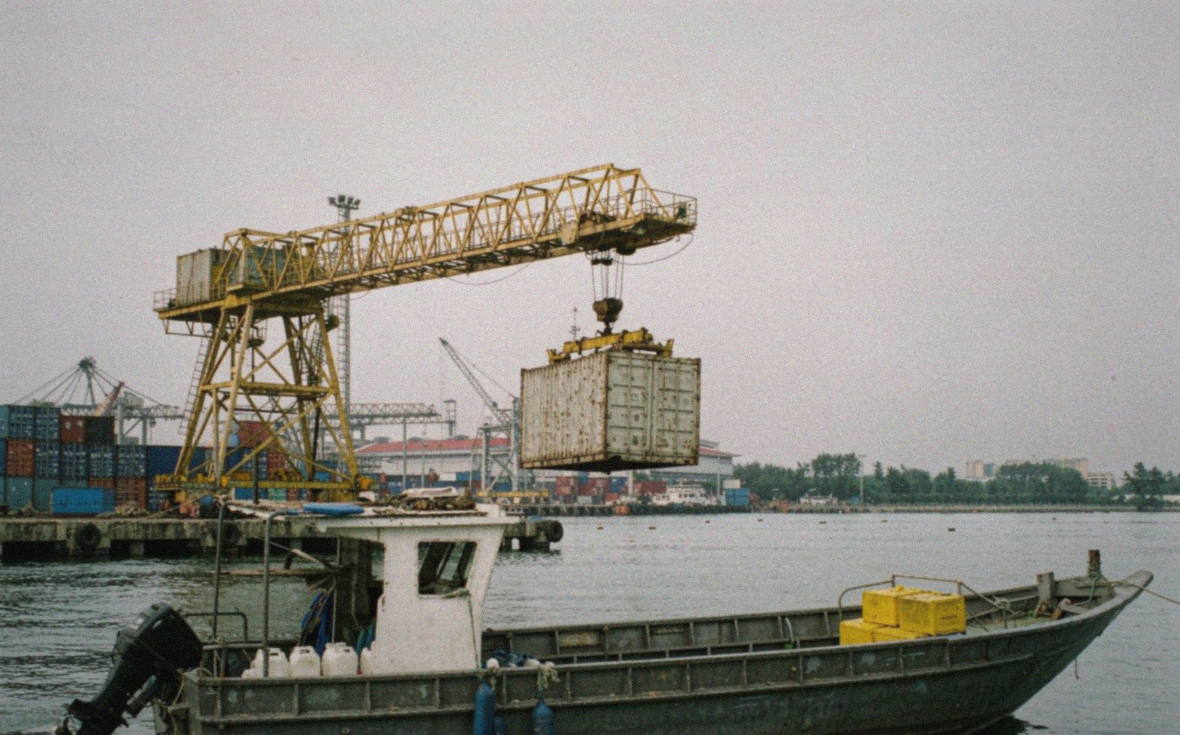 Container ship being loaded at a terminal